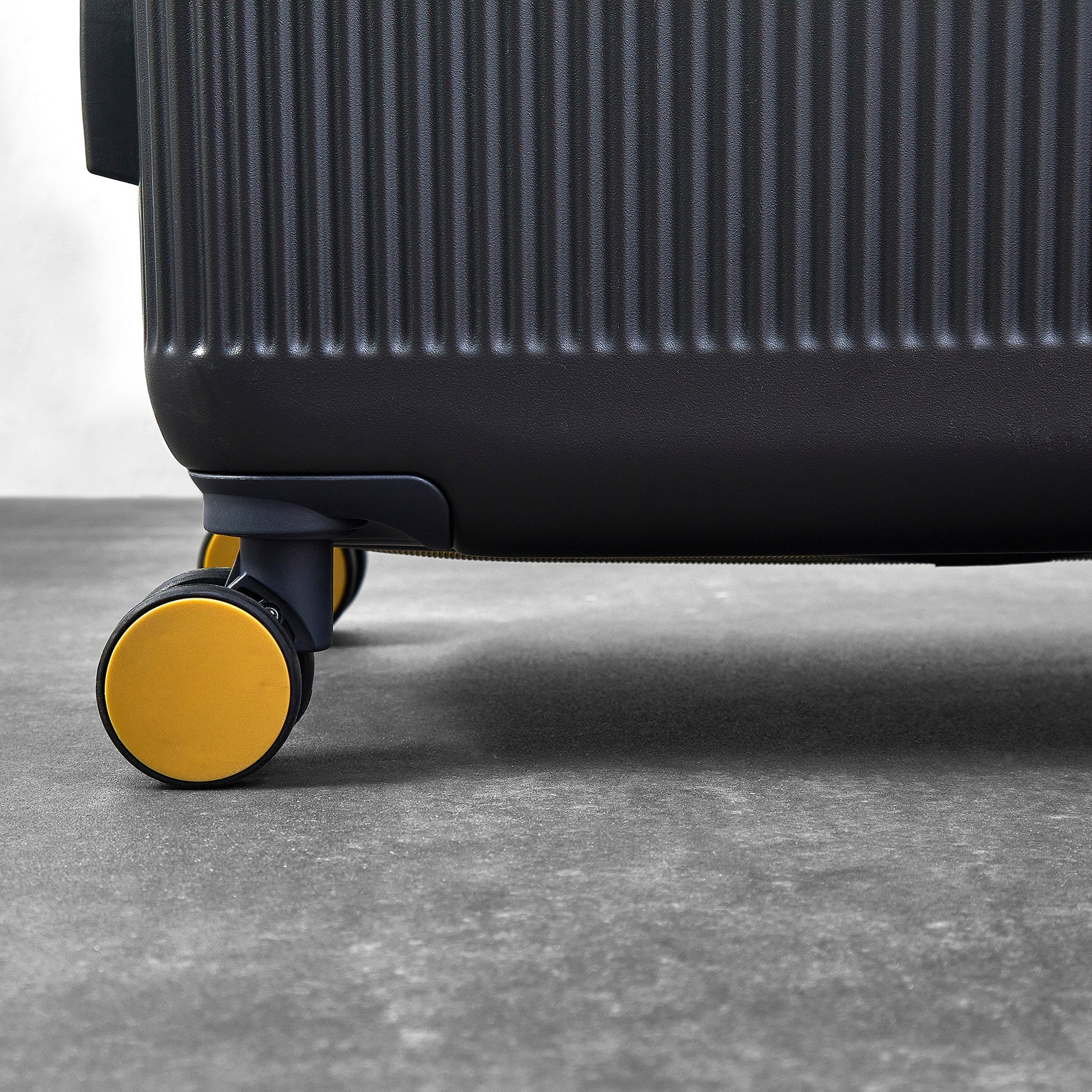 Aria Large Suitcase in Charcoal + Gold - Image 4